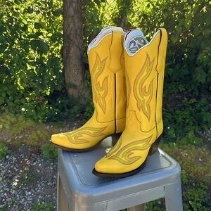 Planet Cowboy’s famous Yellow Rainbow Psychedelic Boots.